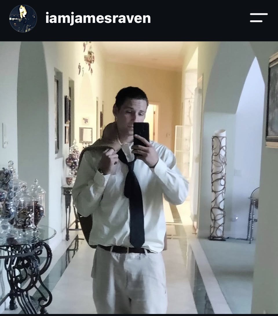 James Raven in formal attire